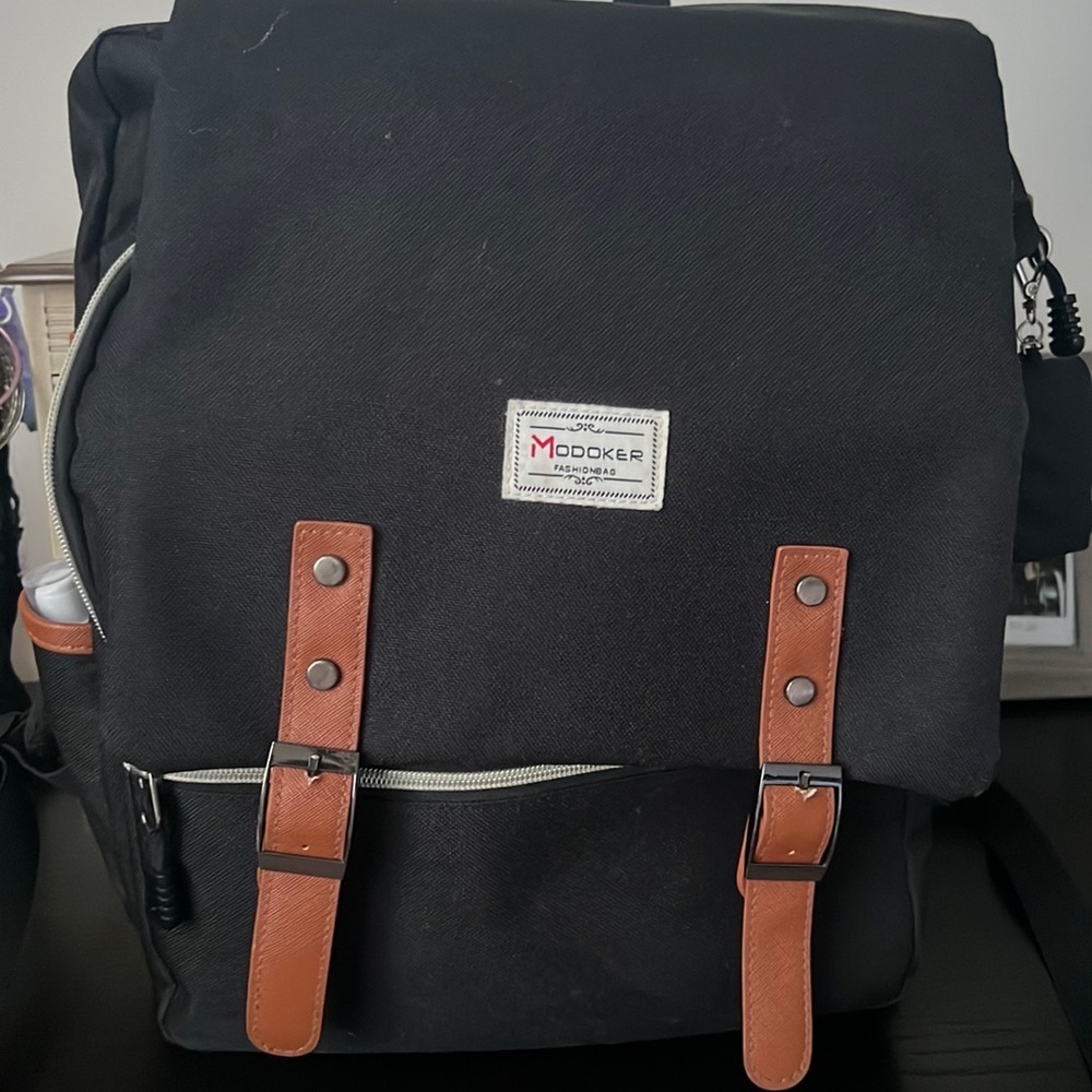 This large multi compact book bag used only one time